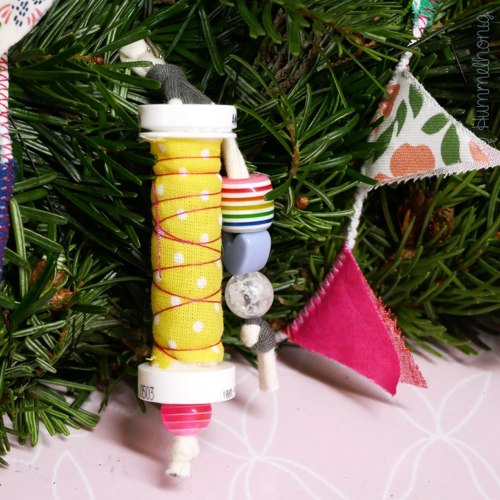 Anhänger Nähgarnrolle